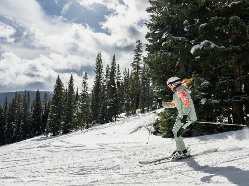 Women skiing mountain